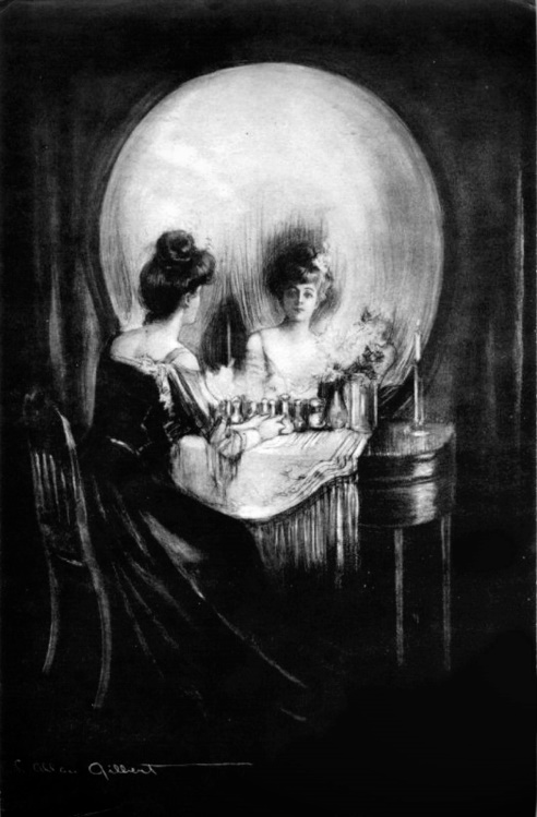a painting showing a woman at vanity looking in a mirror, but with the reflectioin the mirror also looks like a skull.