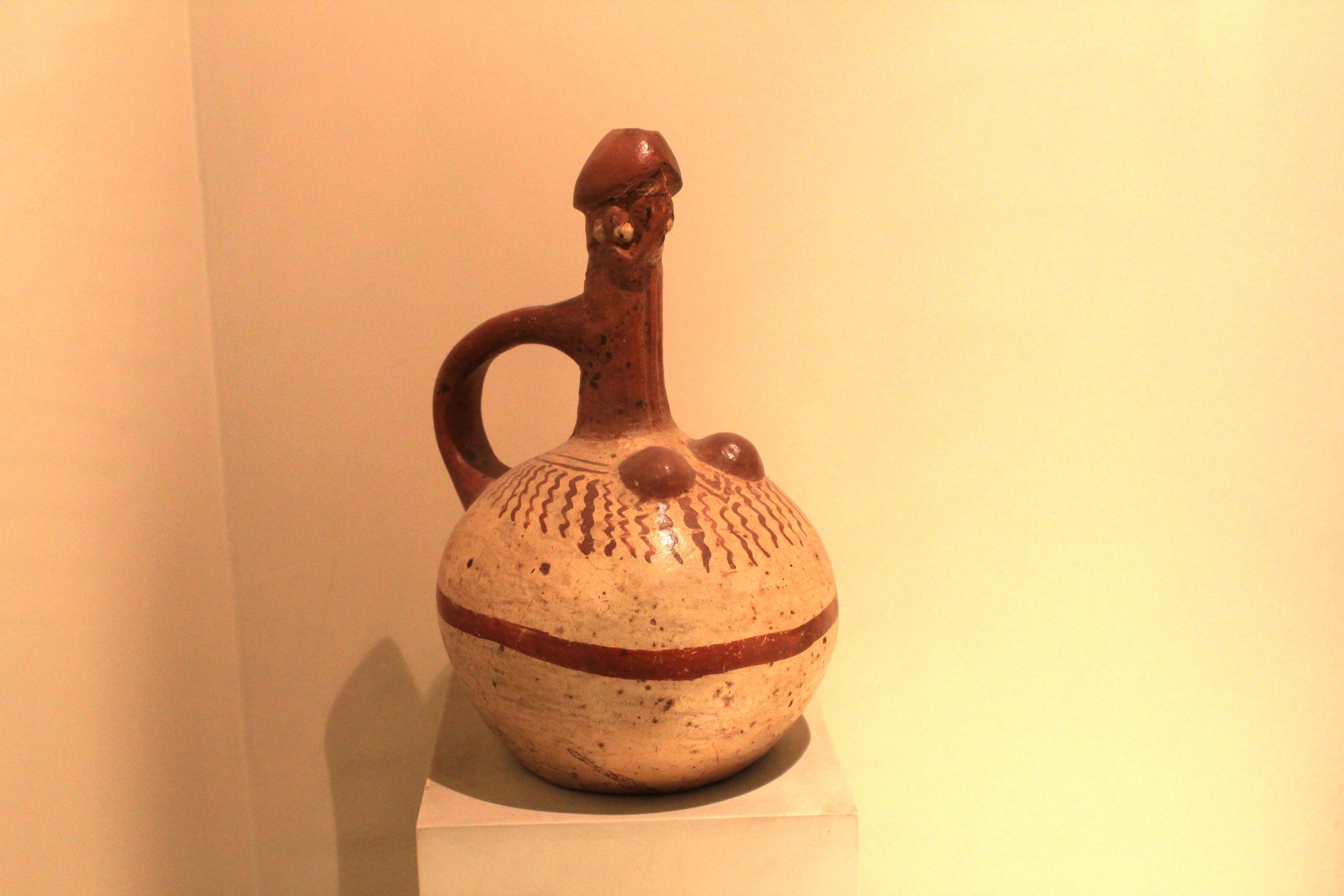 Pottery vessel that depicts a phallus.