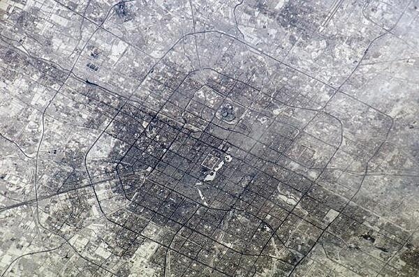 A satellite image of Beijing showing the patterns of streets