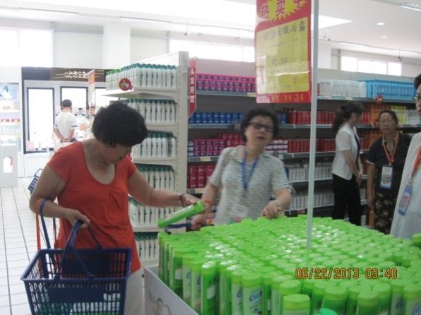 A women shops in a department store.