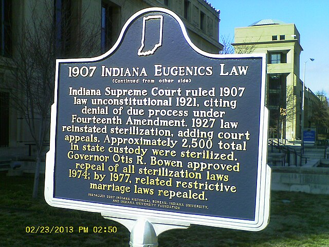Historical marker titled "1907 Indiana Eugenics Law" detailing its history, legal changes, and repeals.